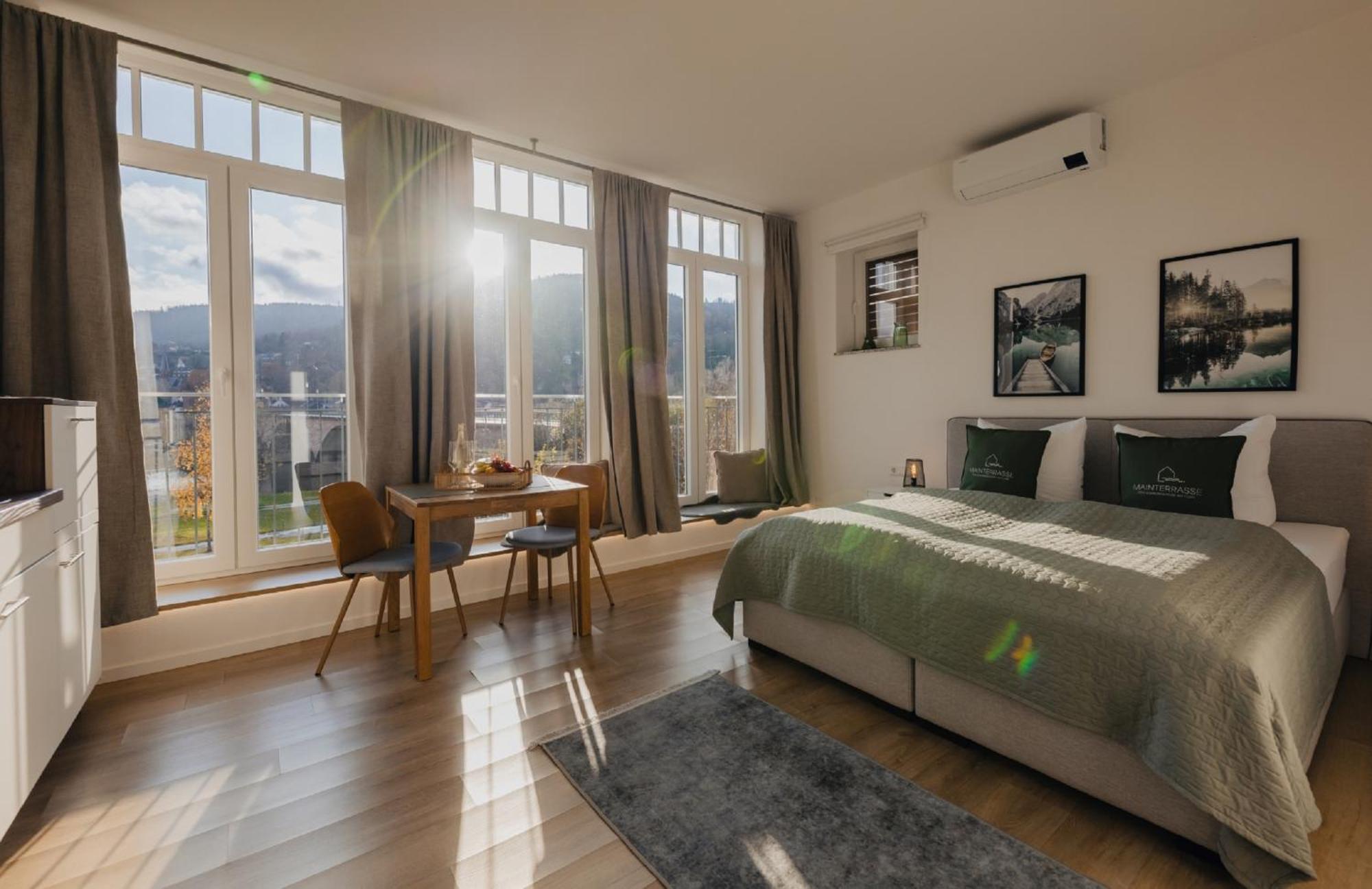 Mainterrasse Boardinghouse Am Fluss Klimatisierte Mit 80qm Terrasse * Miltenberg